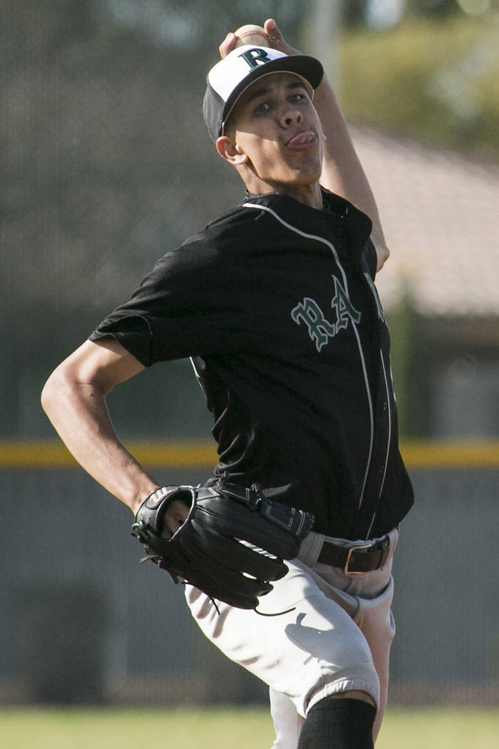 Rancho senior Michael Shy (24) pitches to Silverado at Silverado High School on Tuesday, Mar ...