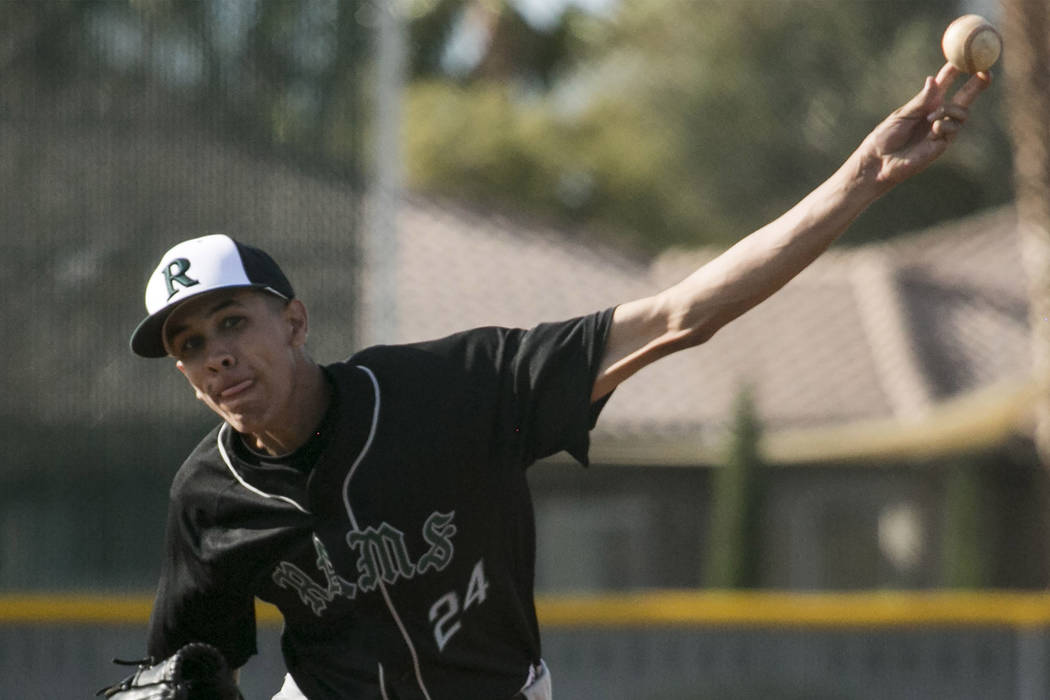 Rancho senior Michael Shy (24) pitches to Silverado at Silverado High School on Tuesday, Mar ...