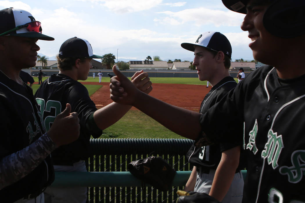 Rancho teammates celebrate after an inning during a game against Silverado at Silverado High ...