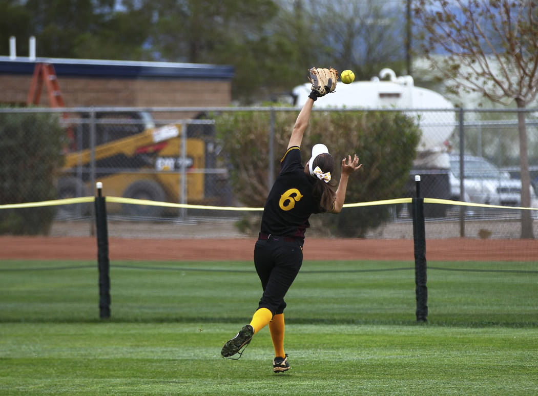 Pahrump’s Amaya Mendoza (6) misses a fly ball during a softball game at Boulder City H ...
