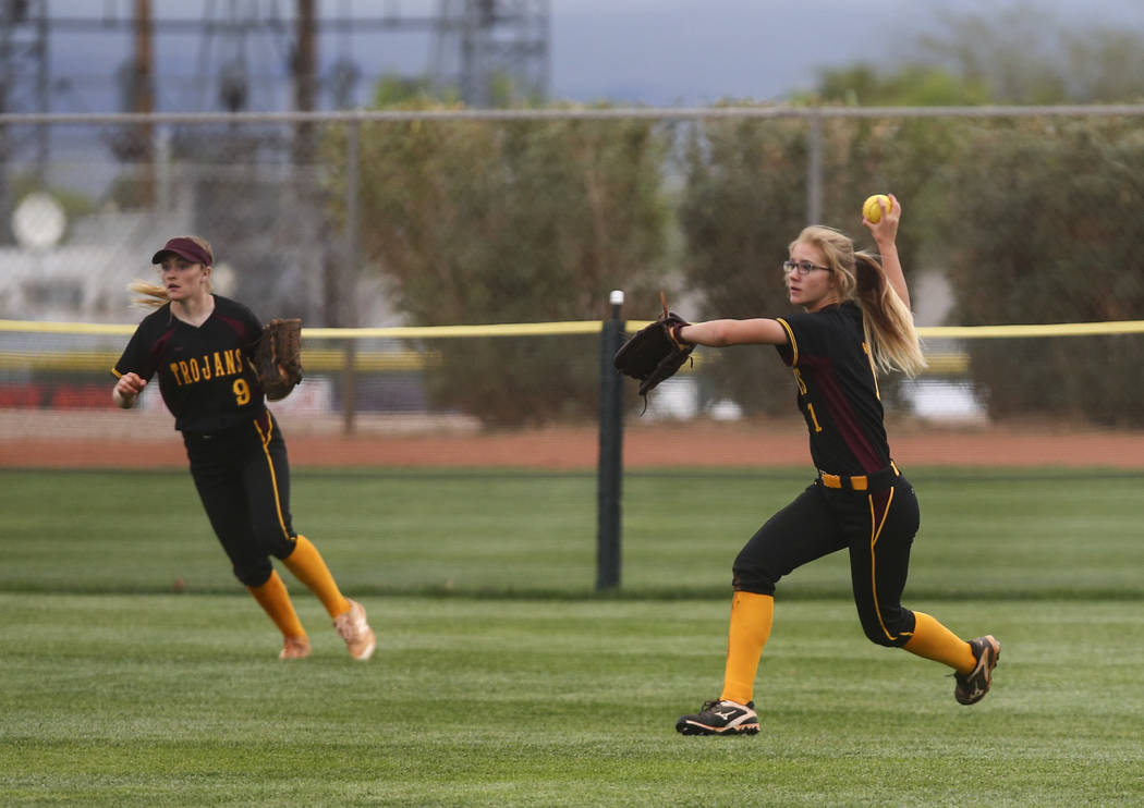 Pahrump’s Terrena Martin (1) looks to throw after catching a fly ball from Boulder Cit ...