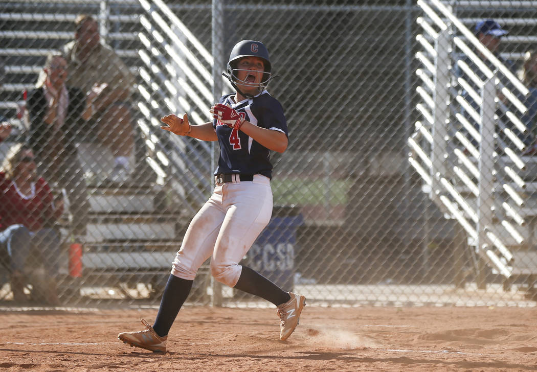 Coronado’s Dylan Underwood (4) scores a run during a softball game at Rancho High Scho ...