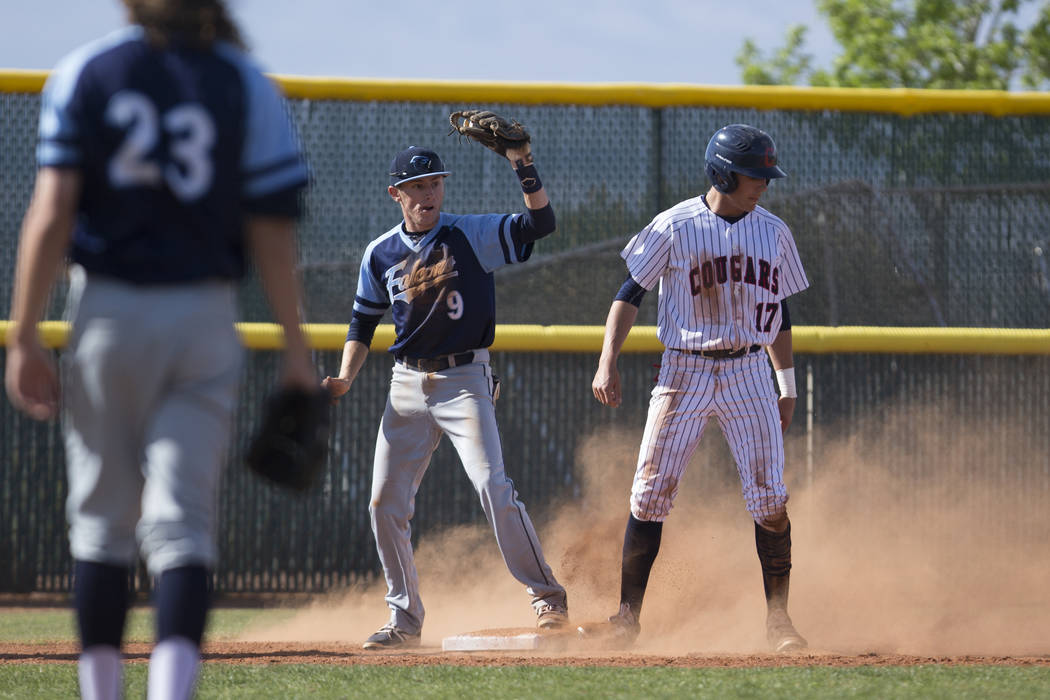 Coronado’s Jake McLean (17) stands safely to third base against Foothill’s Parke ...