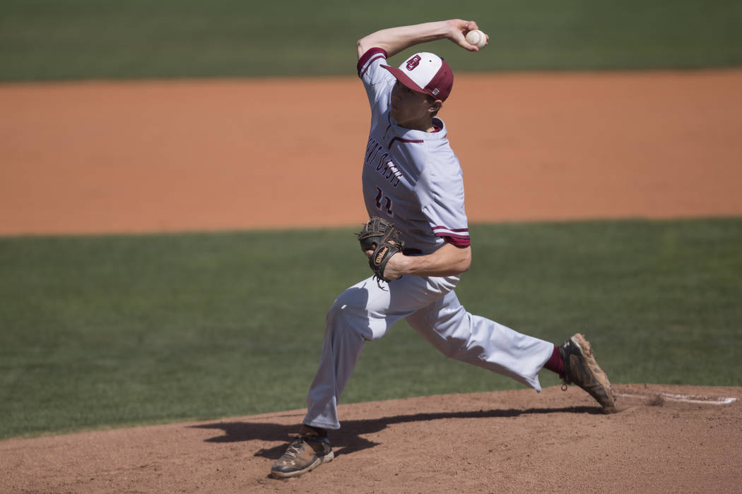 Desert Oasis Brett Brocoff (11) pitches against Bishop Gorman at Bishop Gorman High School o ...