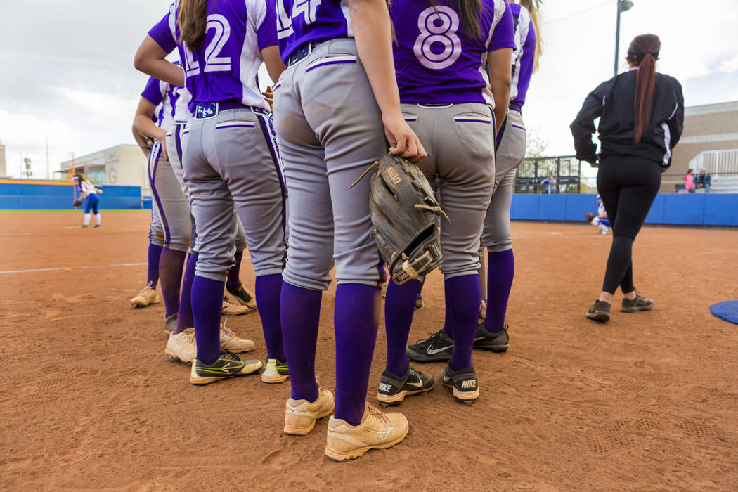 Durango High School softball speaks with head coach Roy Goodell during a game against Bishop ...