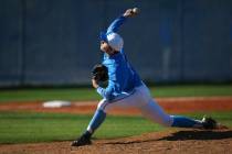 Centennial’s Garrett Holden (21) pitches to Cimarron-Memorial during a baseball game a ...