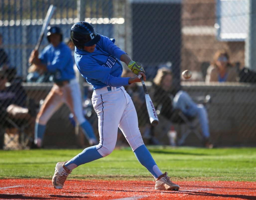 Centennial’s Zack Simon (3) hits against Cimarron-Memorial during a baseball game at C ...