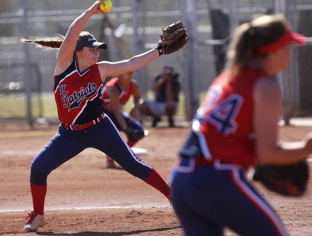 Liberty’s Breanna Alvarez (5) pitches during the first inning of a high school softbal ...