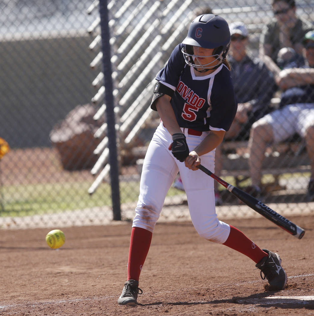 Coronado’s Tatum Spangler (5) swings during the second inning of a high school softbal ...