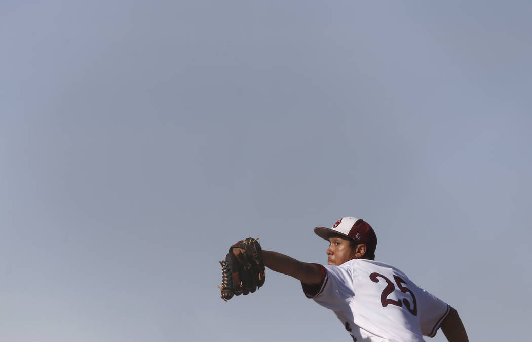 Desert Oasis’s Aaron Roberts (25) pitches during the fourth inning of a high school ba ...