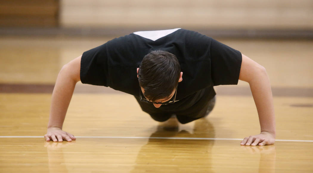 Senior setter Edher Aldaco exercise during volleyball practice at Cimarron-Memorial High Sch ...