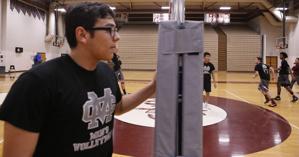Senior setter Edher Aldaco, left, during volleyball practice at Cimarron-Memorial High Schoo ...