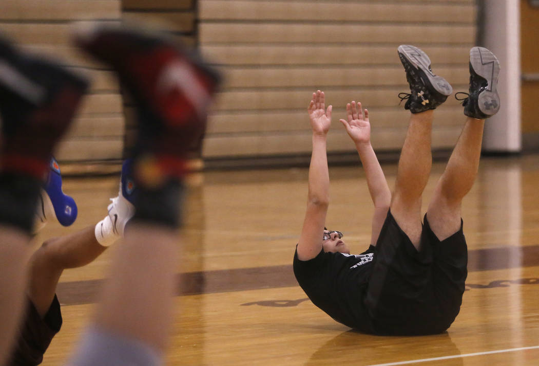 Senior setter Edher Aldaco exercise during volleyball practice at Cimarron-Memorial High Sch ...