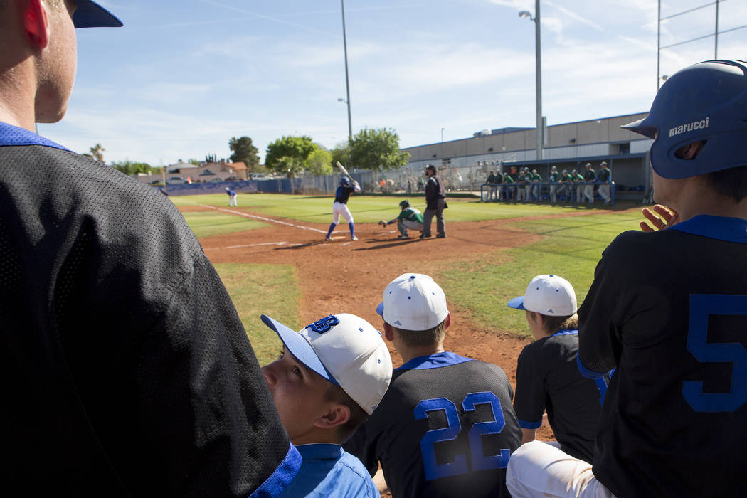 Basic cheers on their teammates as they go up to bat against Green Valley at Basic High Scho ...