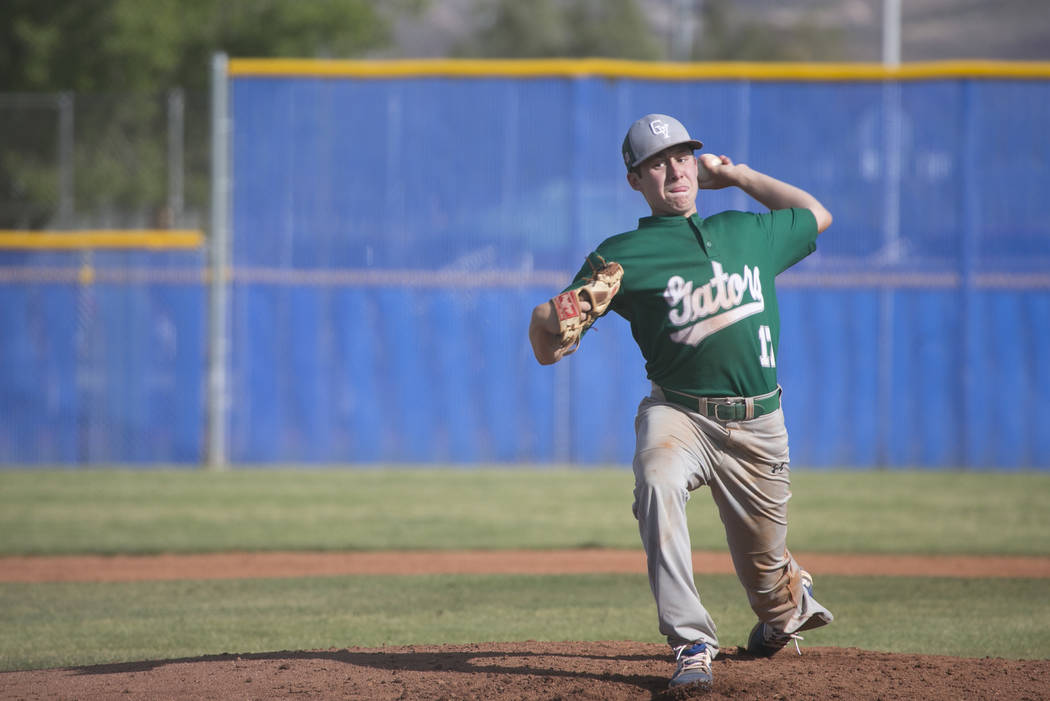 Green Valley junior Joe DiGiacomo pitches to Basic at Basic High School Wednesday, April 5, ...