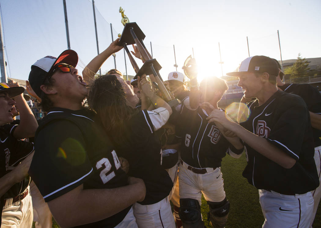 Desert Oasis players celebrate after defeating Jordan 6-3 in the Bishop Gorman Desert Classi ...