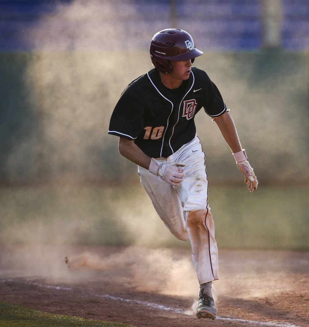 Desert Oasis’ Cole Schaefer (10) runs for first base against Jordan during the Bishop ...