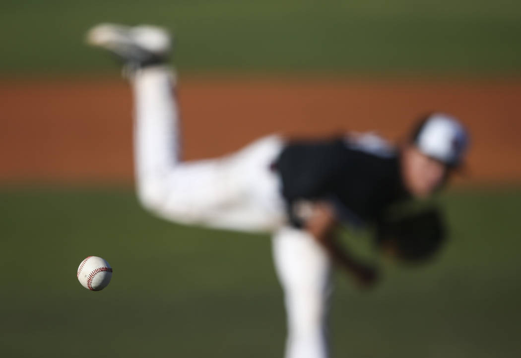 Desert Oasis’ Dustin Mansell (8) pitches to Jordan during the Bishop Gorman Desert Cla ...