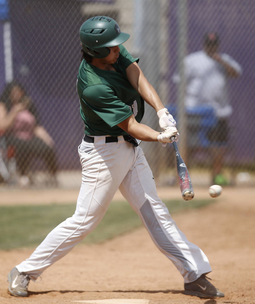 Palo Verde’s J.D. Brooks (21) swings during the third inning of a high school baseball ...