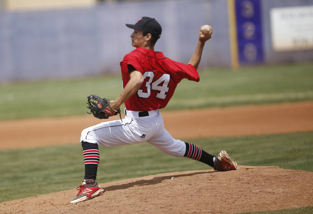 Banning’s Spencer Ezell (34) pitches during the fifth inning of a high school baseball ...