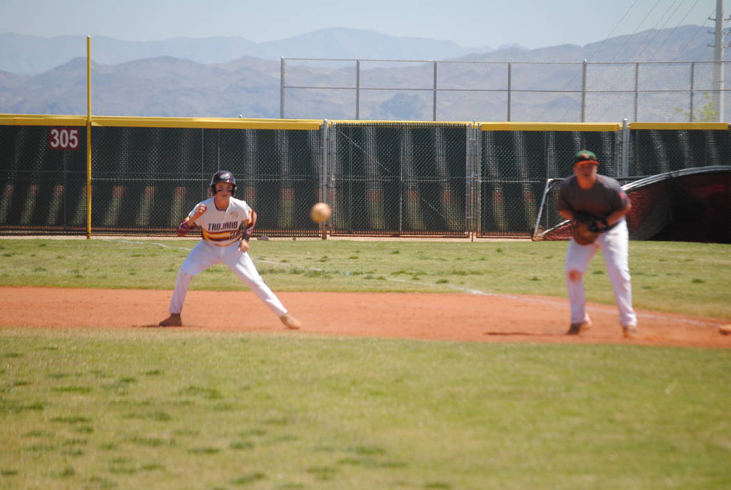 A Pahrump Valley player takes a lead off first base on Wednesday. The Trojans beat Mojave 5- ...