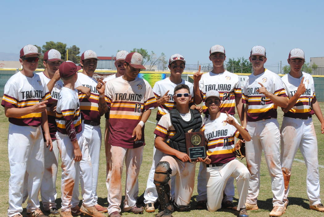 Pahrump Valley players pose with the trophy after beating Mojave 5-0 to capture the Cowboy C ...