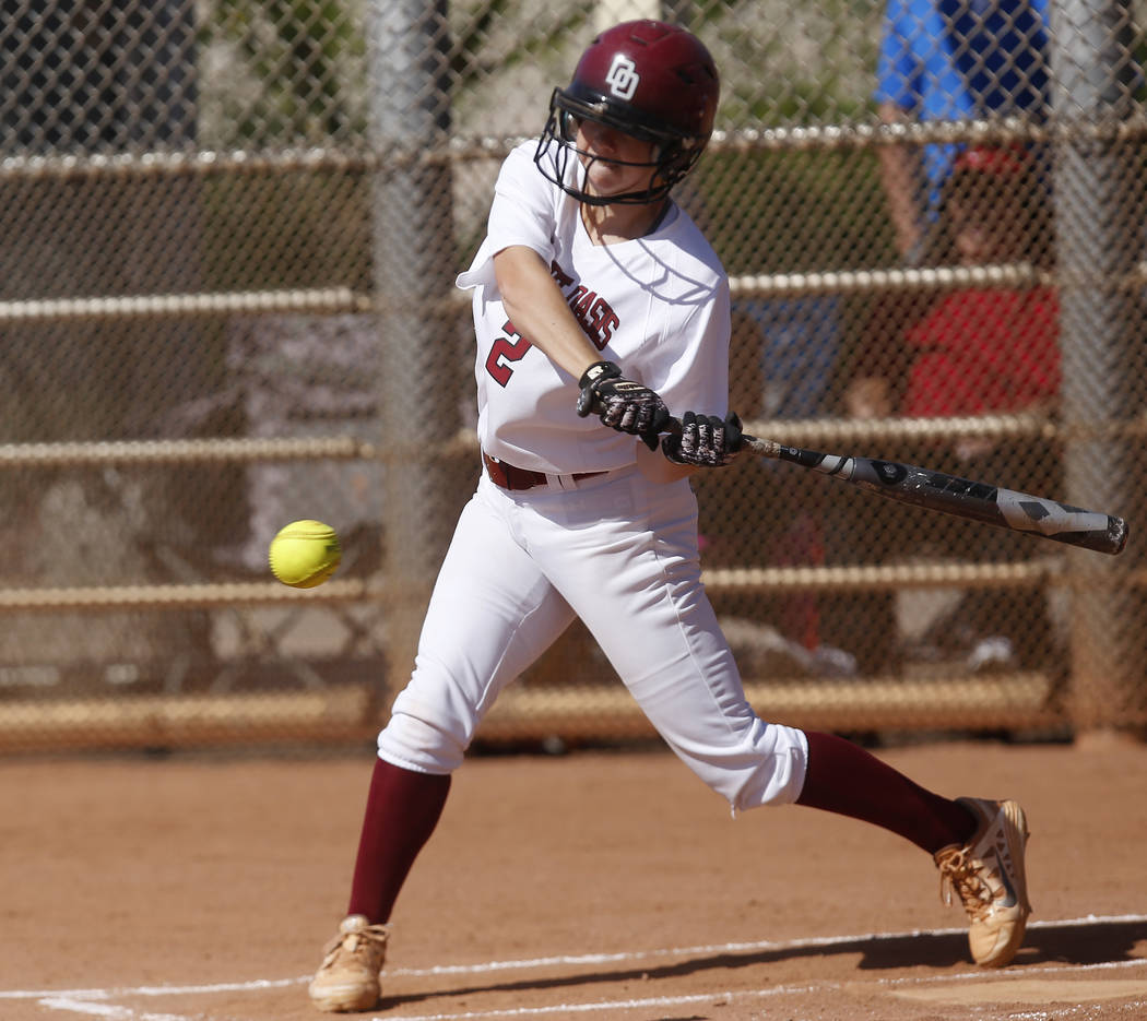 Desert Oasis’s Meagan Anders (2) swings during a high school softball game at Majestic ...