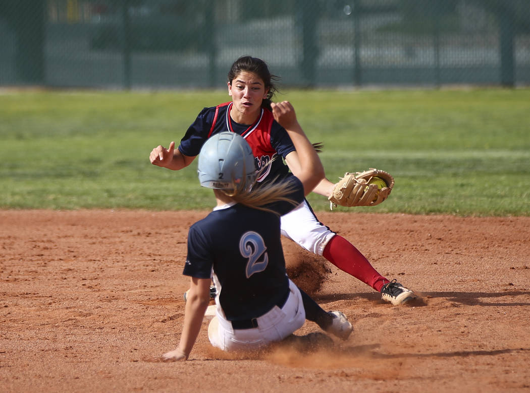 Foothill’s Kylie Becker (2) slides safely into second base against Liberty’s Ash ...