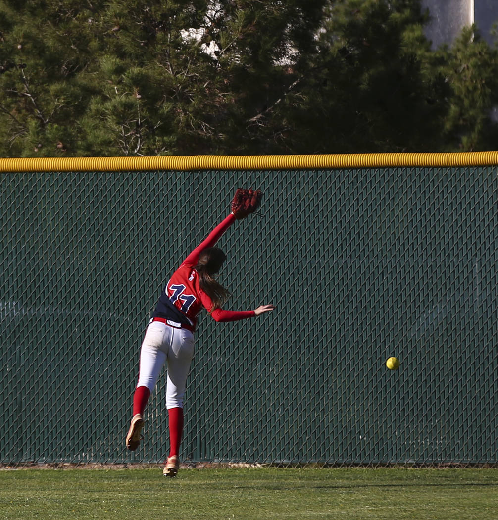 Liberty’s Marisa Olmos (11) misses a fly ball from Foothill’s Katelyn Enzweiler ...
