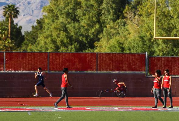 Arbor View freshman Blake Dickinson competes in the 400-meter dash during a track and field ...