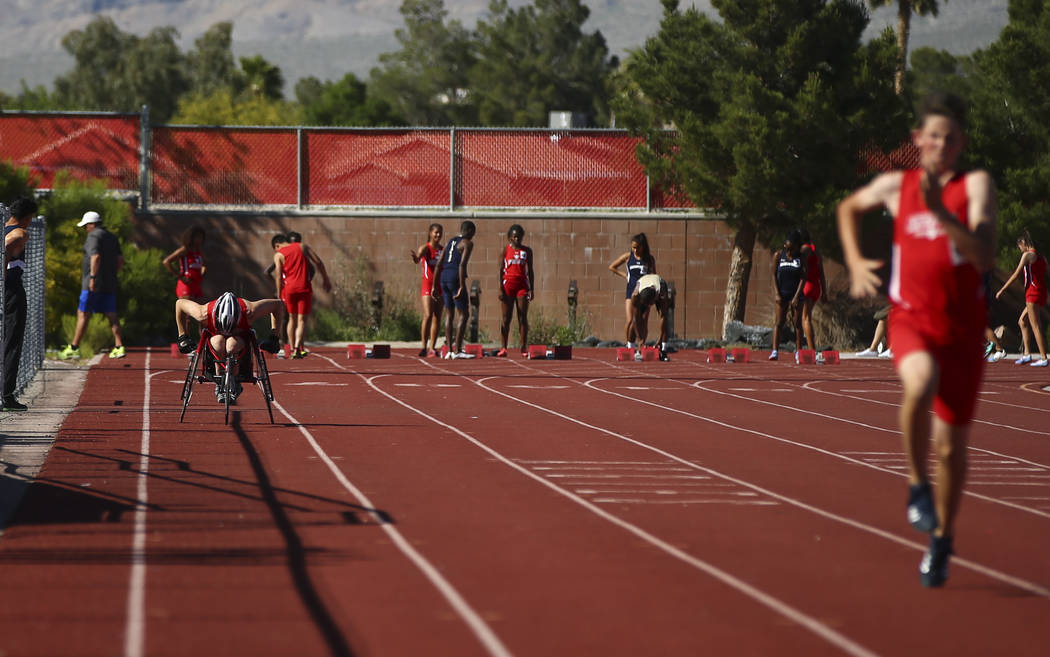 Arbor View freshman Blake Dickinson, far left, competes in the 100-meter dash during a track ...