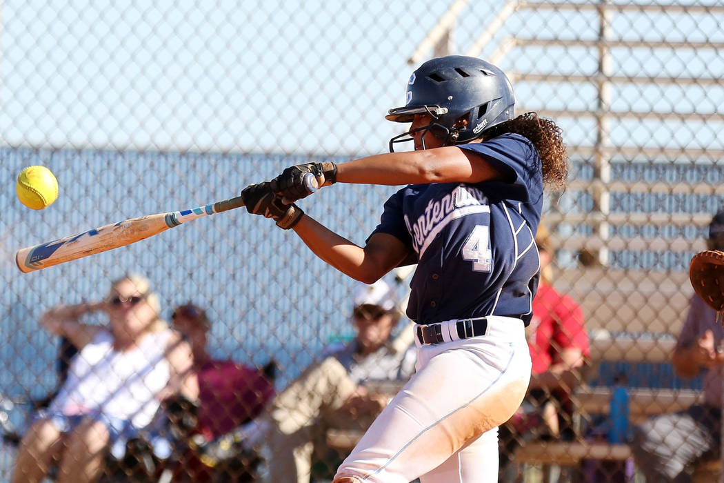 Centennial’s Kiana Tate hits a home run in the fourth inning against Faith Lutheran at ...