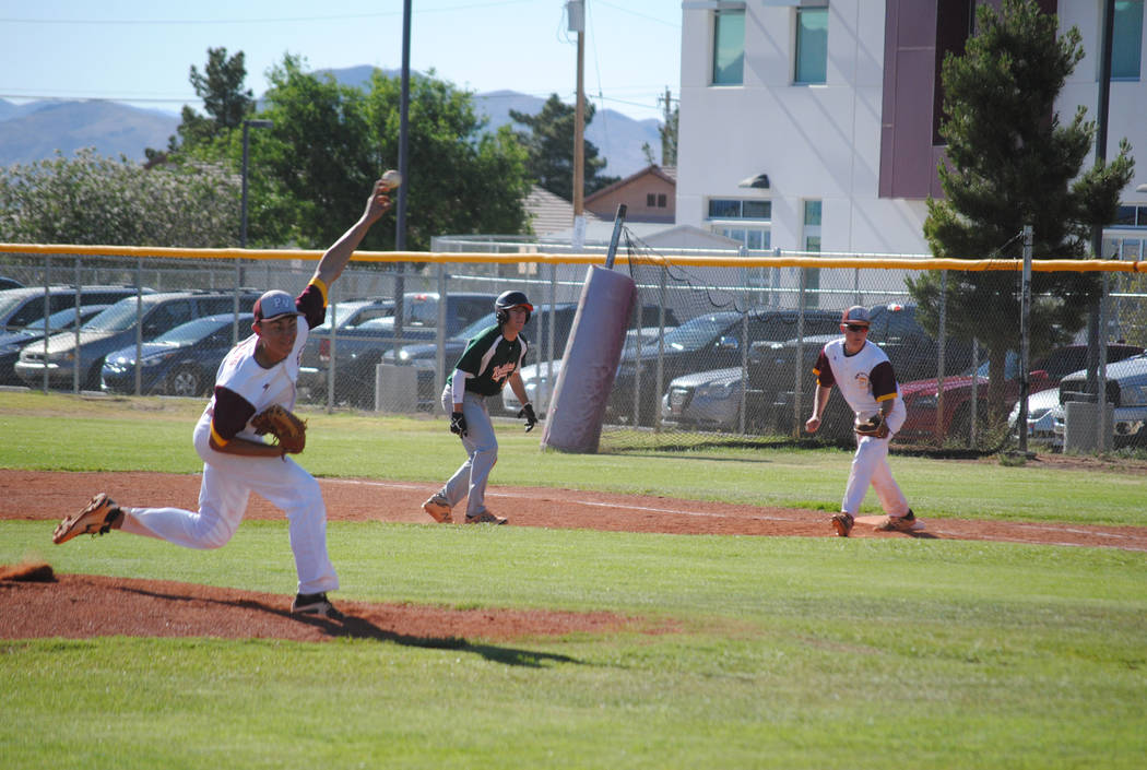 Pahrump Valley starter Garrett Lucas delivers a pitch against Mojave at Pahrump Valley High ...
