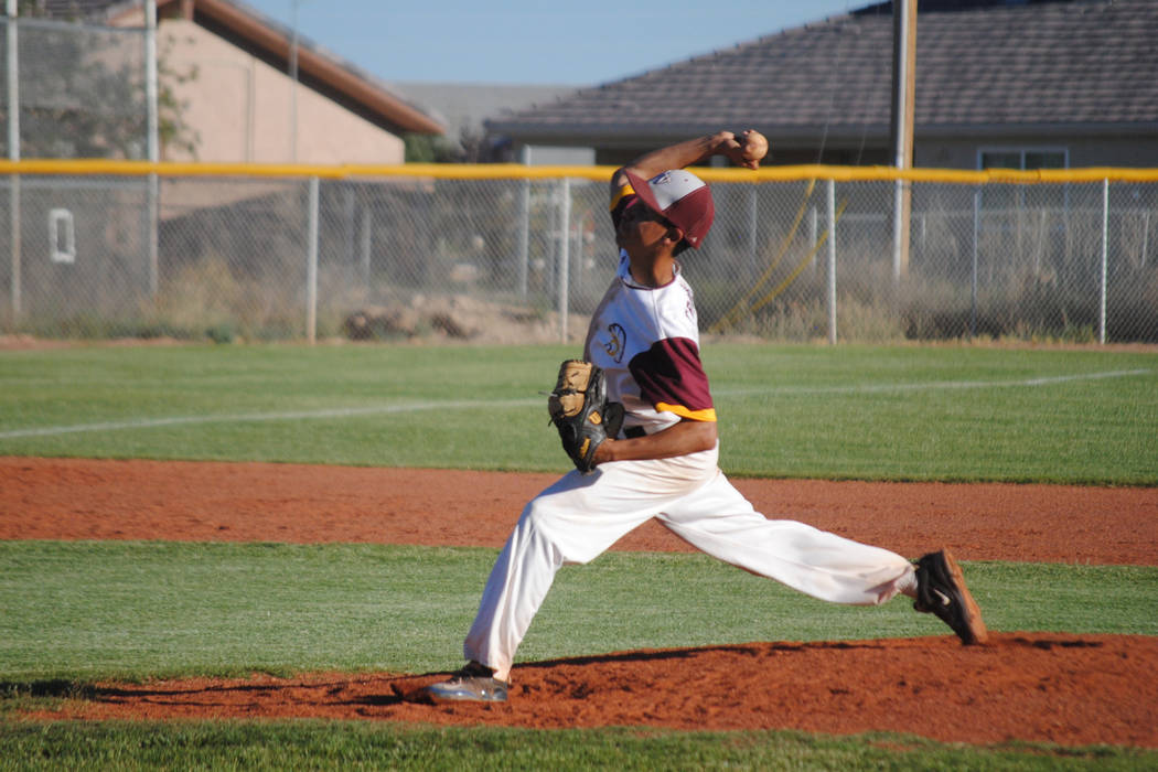 Reliever Josh Ferrer delivers a pitch against Mojaveat Pahrump Valley High School, Thursday, ...
