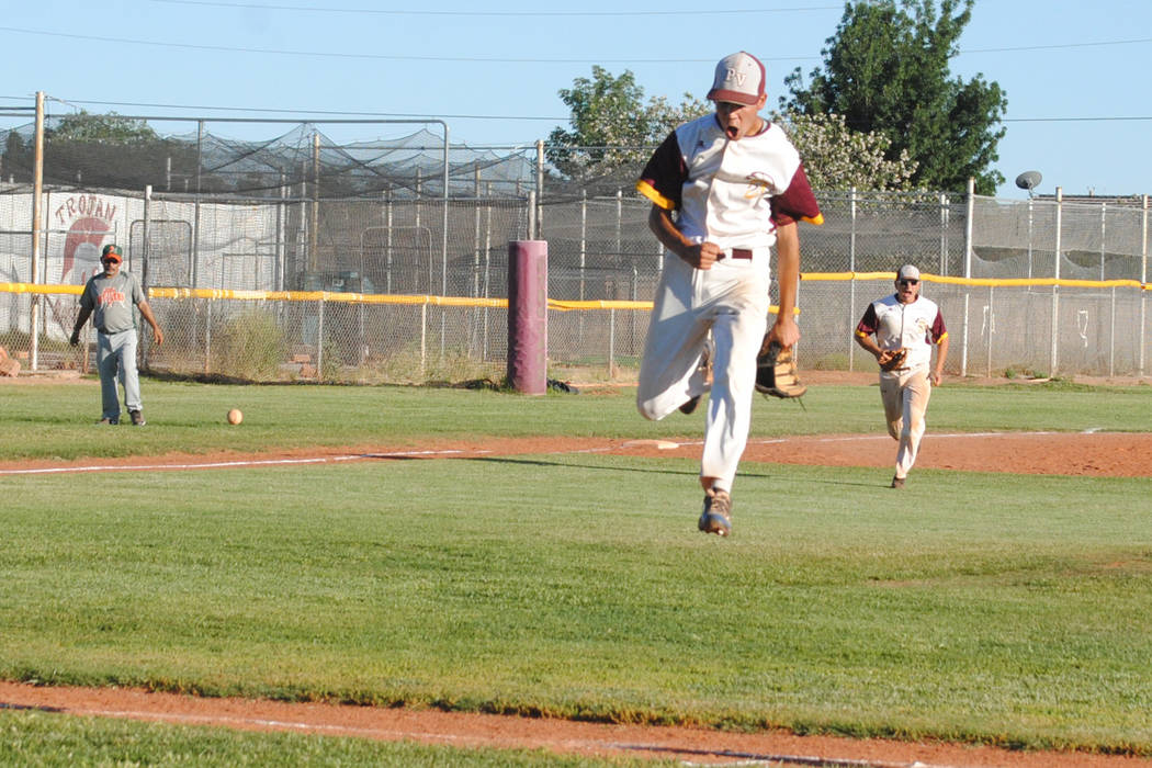 Pahrump Valley’s Josh Ferrer celebrates after recording the final out against Mojave a ...