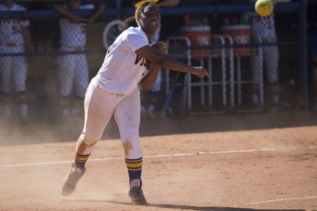 Sierra Vista’s Harmony Dominguez (14) throws to first base for an out against Durango ...