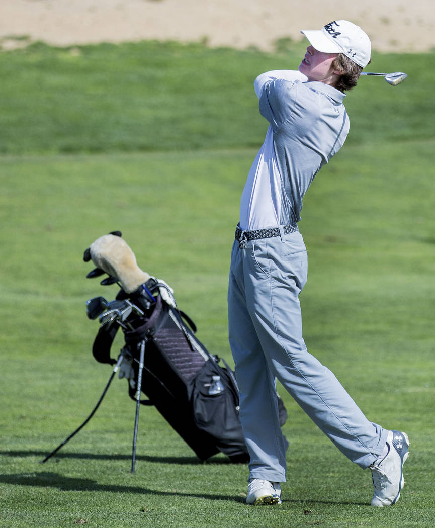 Faith Lutheran’s Jared Ramsay hits his second shot on the 18th hole during the Sunset ...