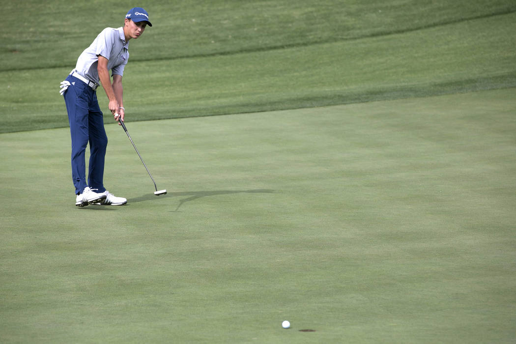 Coronado sophomore Benjamin Sawaia hits the ball on the 14th hole of the Sunrise Region golf ...