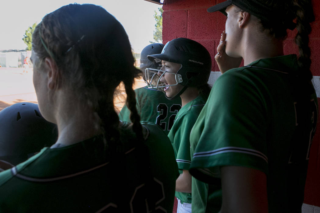 Rancho teammates cheer from the dugout during their playoff game against Liberty at Liberty ...
