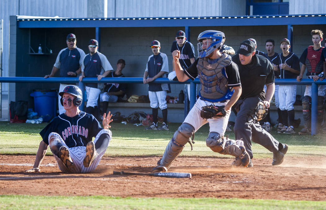 Basic catcher Roger Riley cheers after tagging Coronado’s Ryan Murphy out at home plat ...