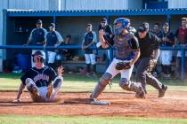 Basic catcher Roger Riley cheers after tagging Coronado’s Ryan Murphy out at home plat ...