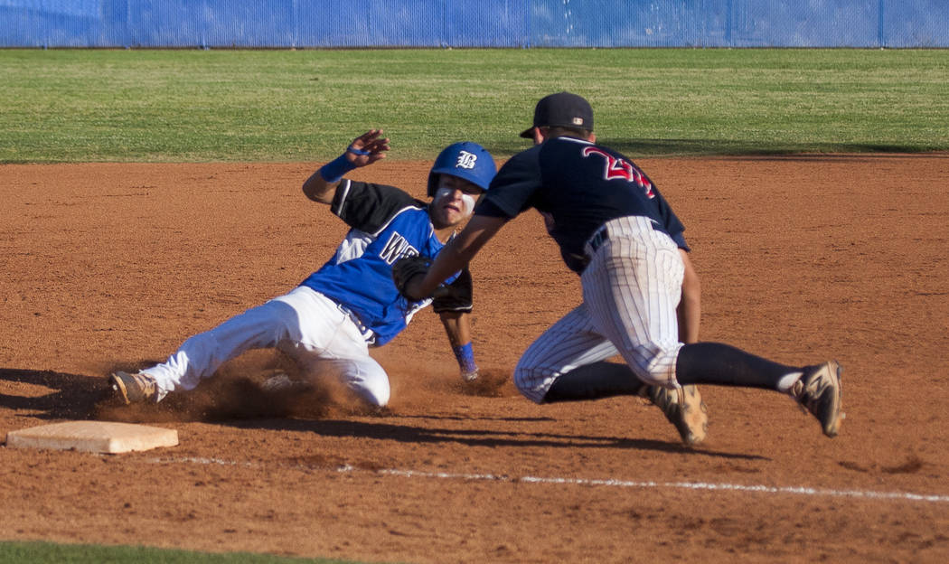 Coronado’s Cristian Herrera tags out a Basic player at third at Basic High School in H ...