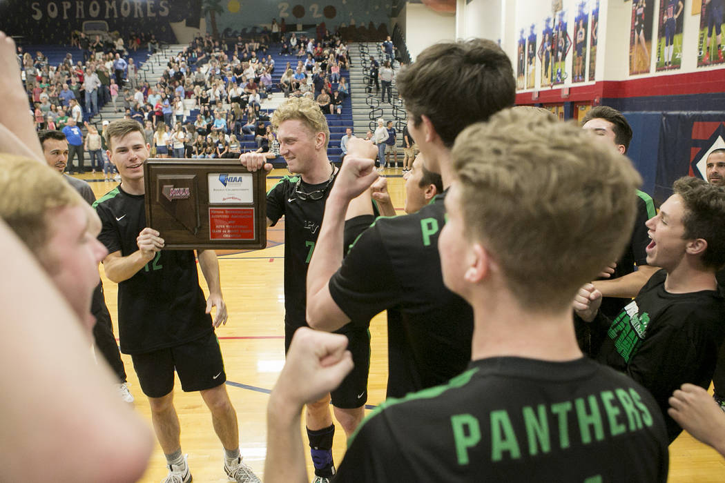 Palo Verde players celebrate after defeating Centennial for the Sunset Region volleyball fin ...