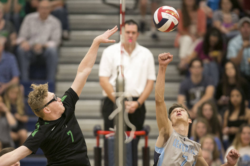 Palo Verde senior Grant Tingey (7), left, attempts to block Centennial’s Sam Belnap (7 ...