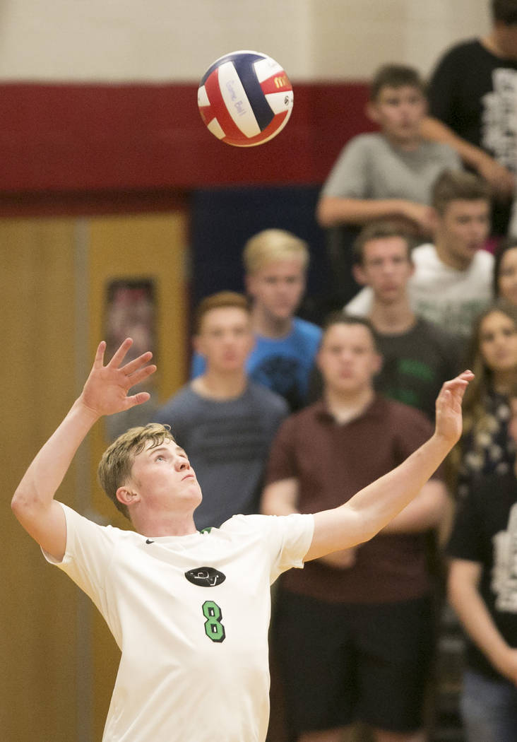 Palo Verde senior Zach Nelson (8) serves the ball at Centennial High School Friday, May 12, ...