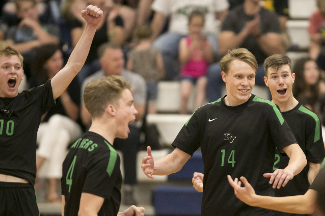 Palo Verde players celebrate during a match against Centennial for the Sunset Region volleyb ...