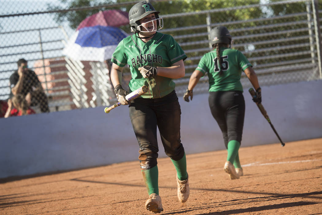 Rancho’s Gianna Carosone (66) reacts after scoring a run against Liberty at Foothill H ...