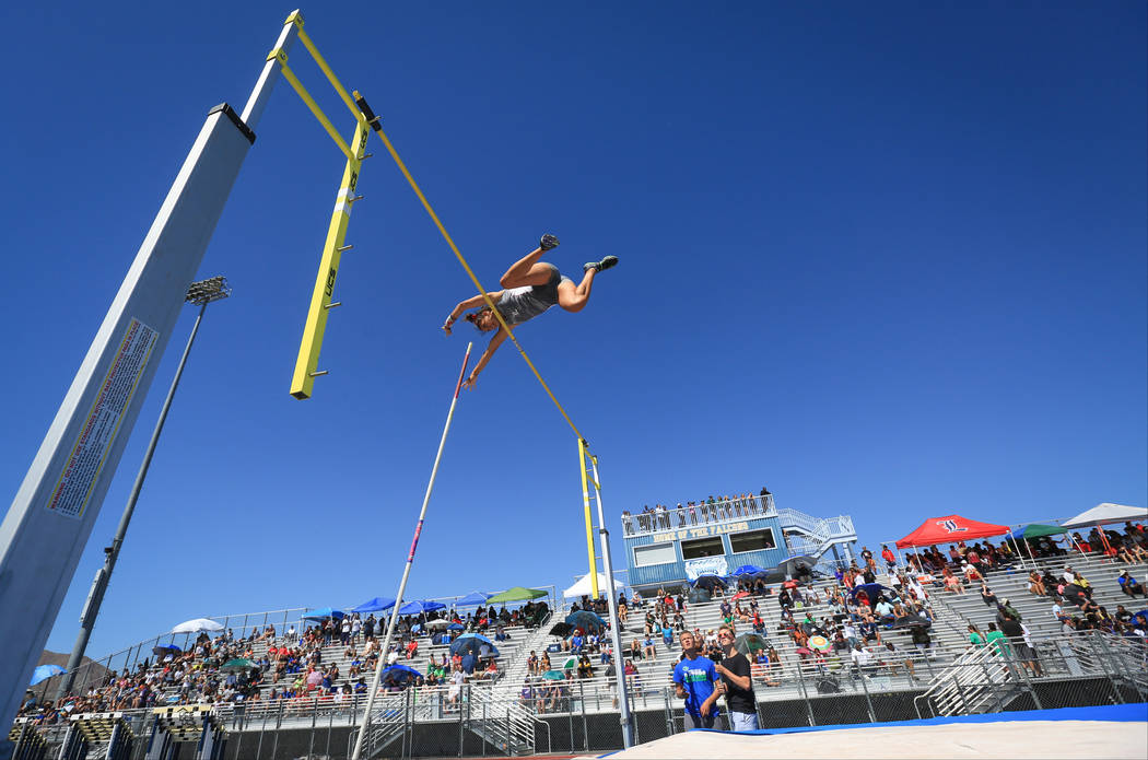 Gabby Carson, of Liberty High School, competes in the pole vault during the Sunset and Sunri ...