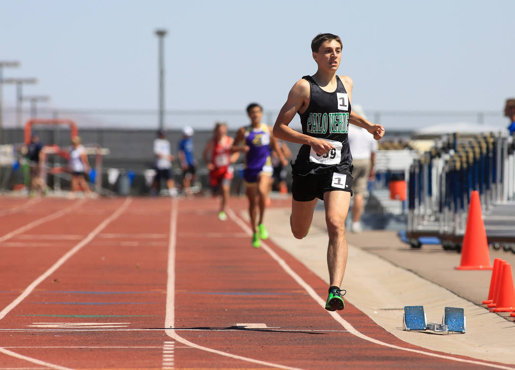 Daniel Ziems, of Palo Verde High School, crosses the finish line to win the boy’s 1600 ...