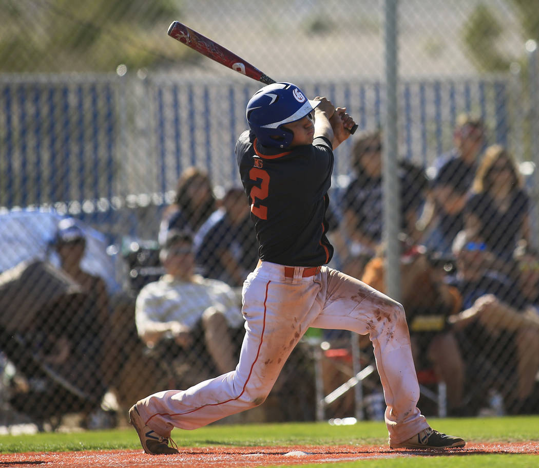 Bishop Gorman batter Tyler Curtis (2) takes a swing during the Sunset Region baseball champi ...